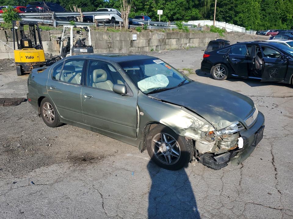 Photo 4 from auction – 2001 INFINITI G20 with VIN JNKCP11A11T401447