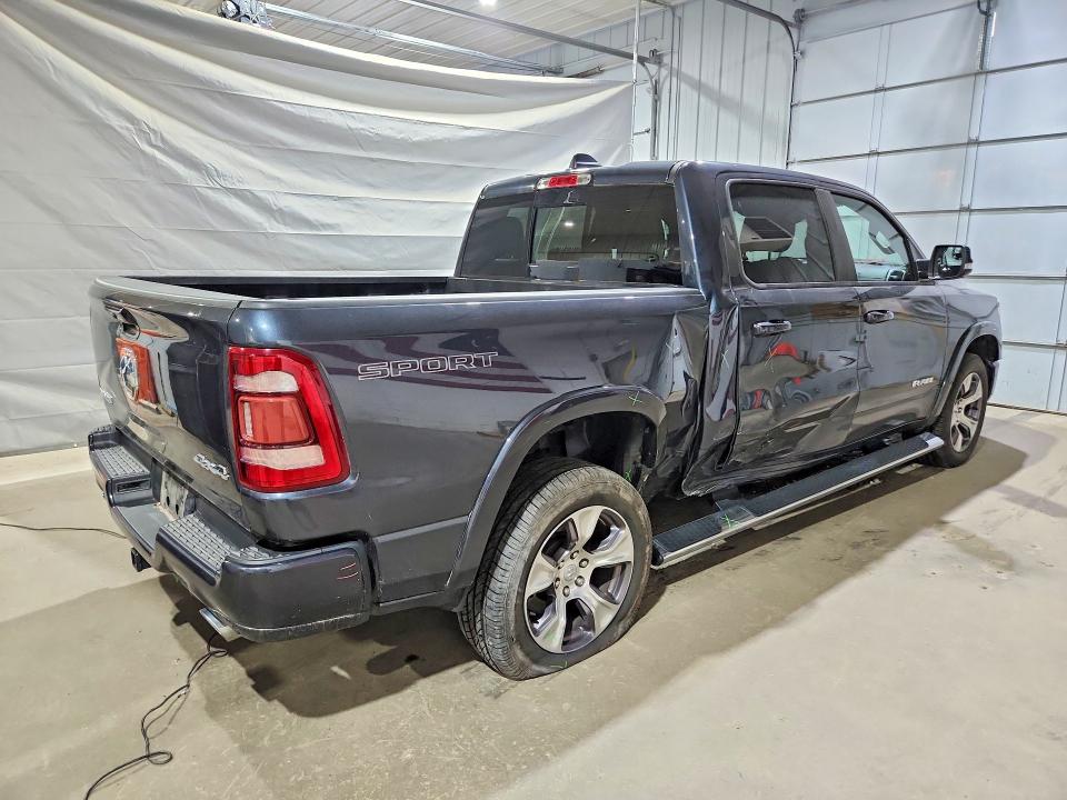 Photo 3 from auction – 2021 RAM 1500 with VIN 1C6SRFJT8MN800989