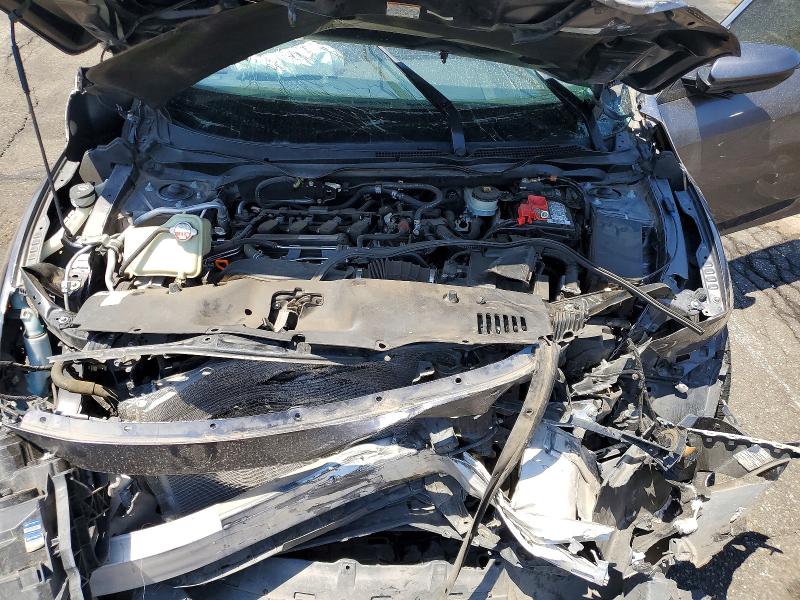 Photo 11 from auction – 2018 HONDA CIVIC with VIN JHMFC1F74JX021291