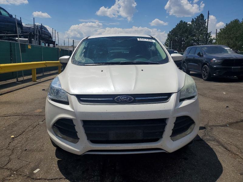 Photo 5 from auction – 2015 FORD ESCAPE with VIN 1FMCU9G9XFUB49488