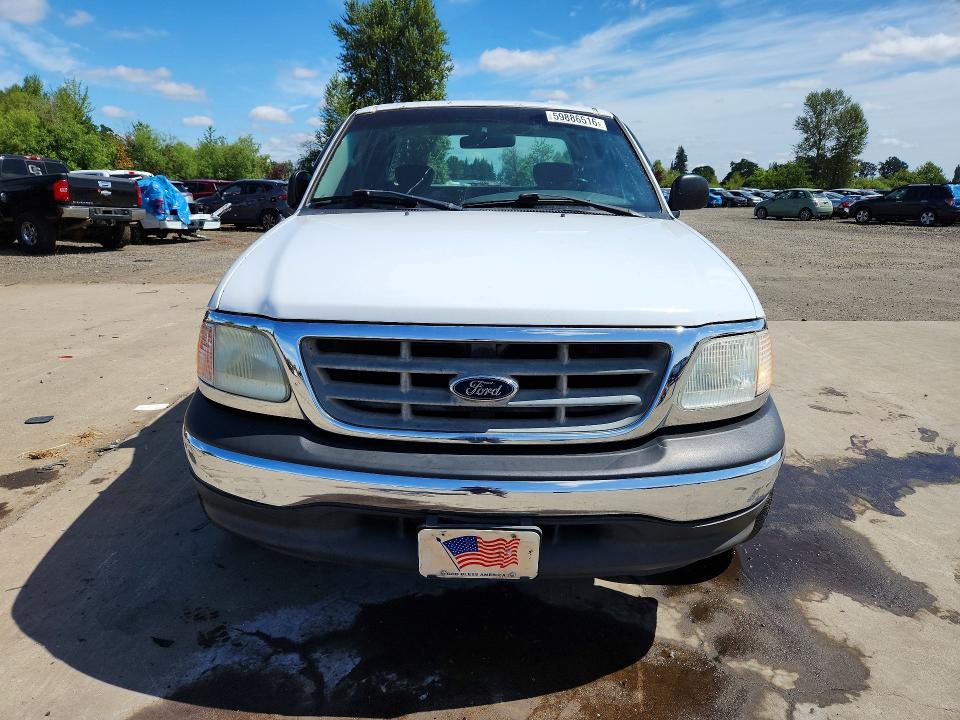 Photo 5 from auction – 2002 FORD F150 with VIN 1FTRX17WX2NB18789