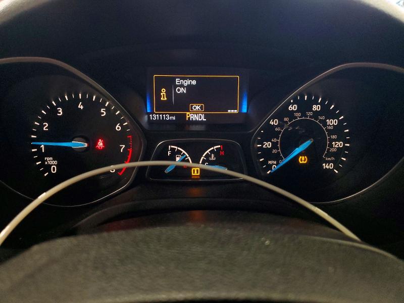 Photo 9 from auction – 2015 FORD FOCUS with VIN 1FADP3F20FL300190