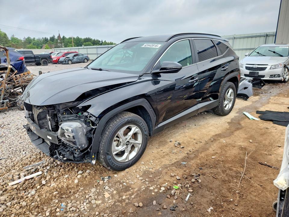 HYUNDAI TUCSON 2022 with VIN KM8JBCAEXNU018589 - Photo from auction
