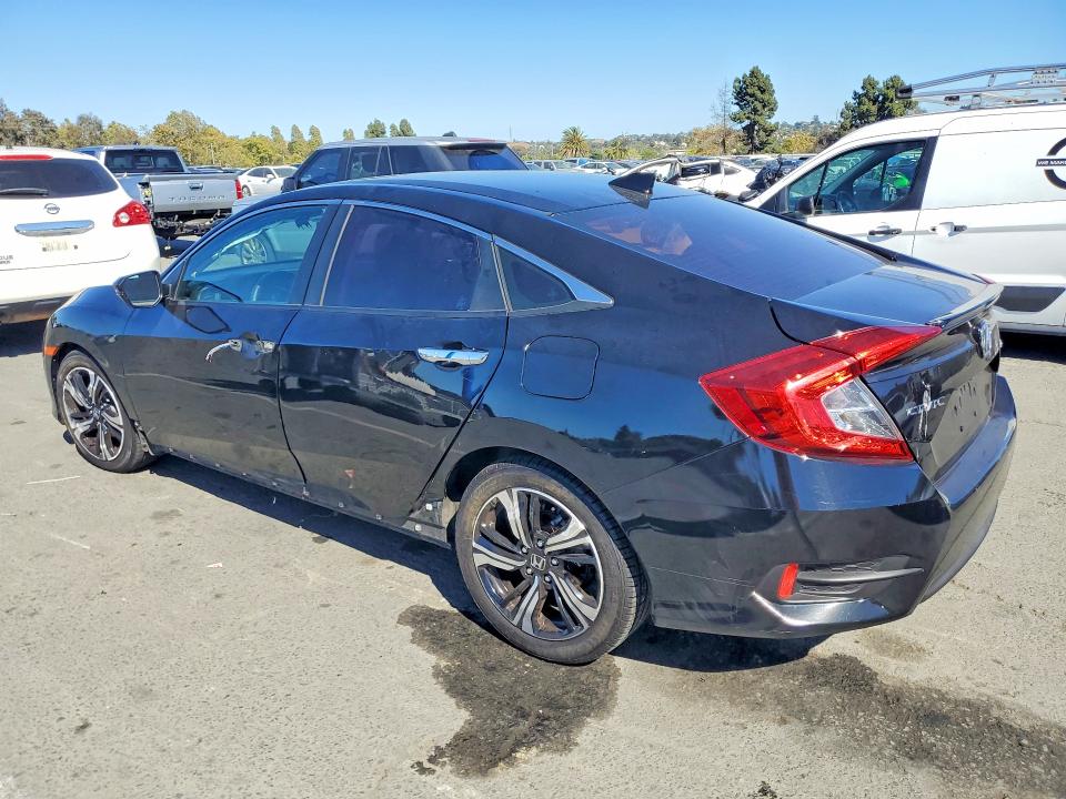 Photo 2 from auction – 2017 HONDA CIVIC with VIN 2HGFC1F95HH658435