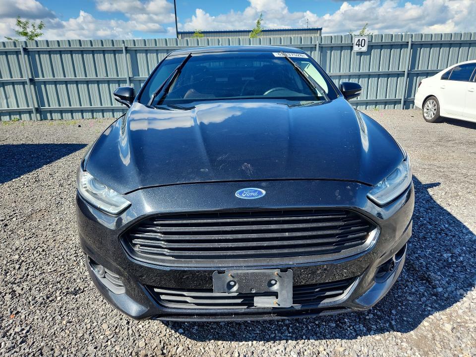 Photo 5 from auction – 2014 FORD FUSION with VIN 3FA6P0HD2ER325520