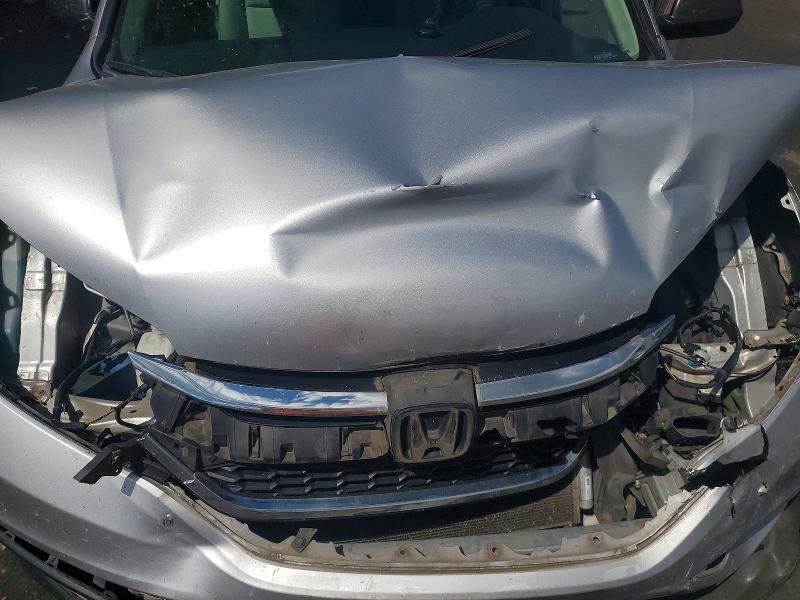 Photo 11 from auction – 2016 HONDA CR-V with VIN 2HKRM4H35GH638517