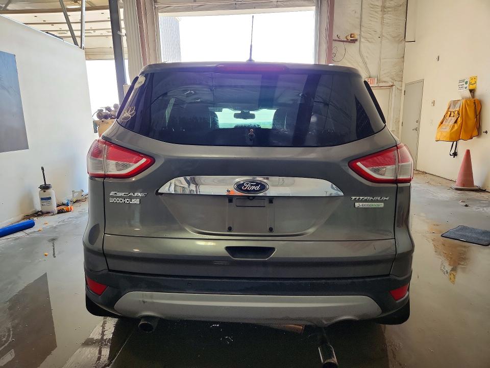 Photo 6 from auction – 2014 FORD ESCAPE with VIN 1FMCU0J90EUC84823
