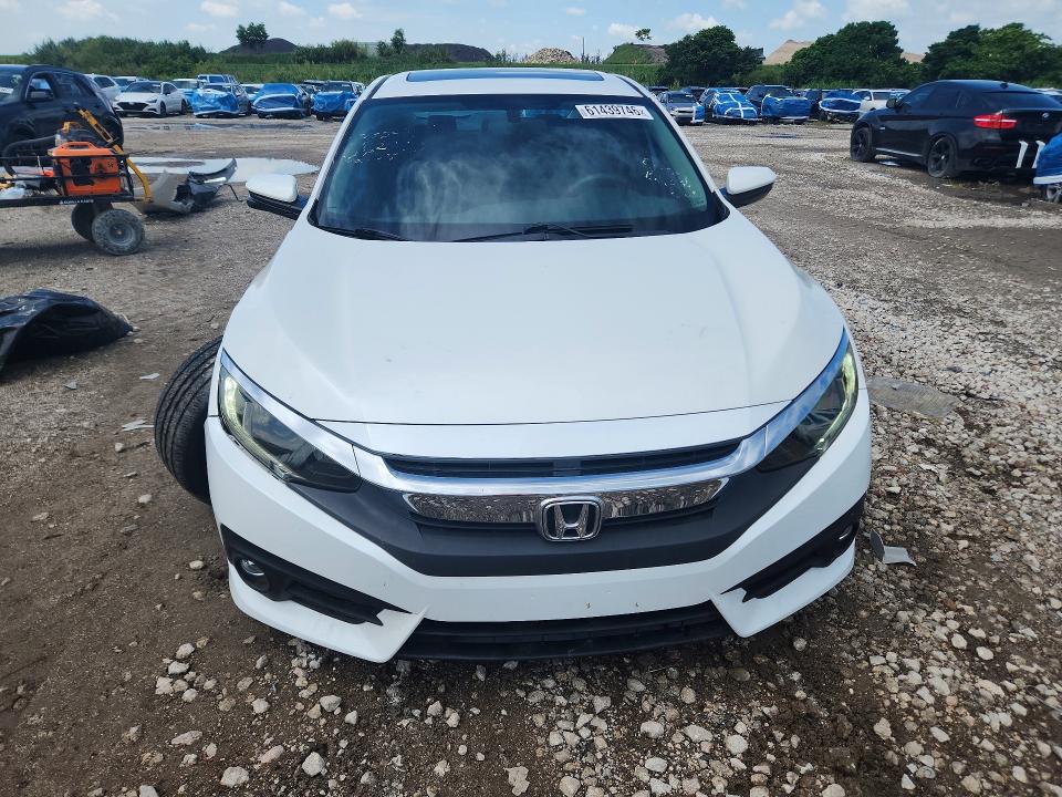 Photo 5 from auction – 2016 HONDA CIVIC with VIN 19XFC2F71GE078953