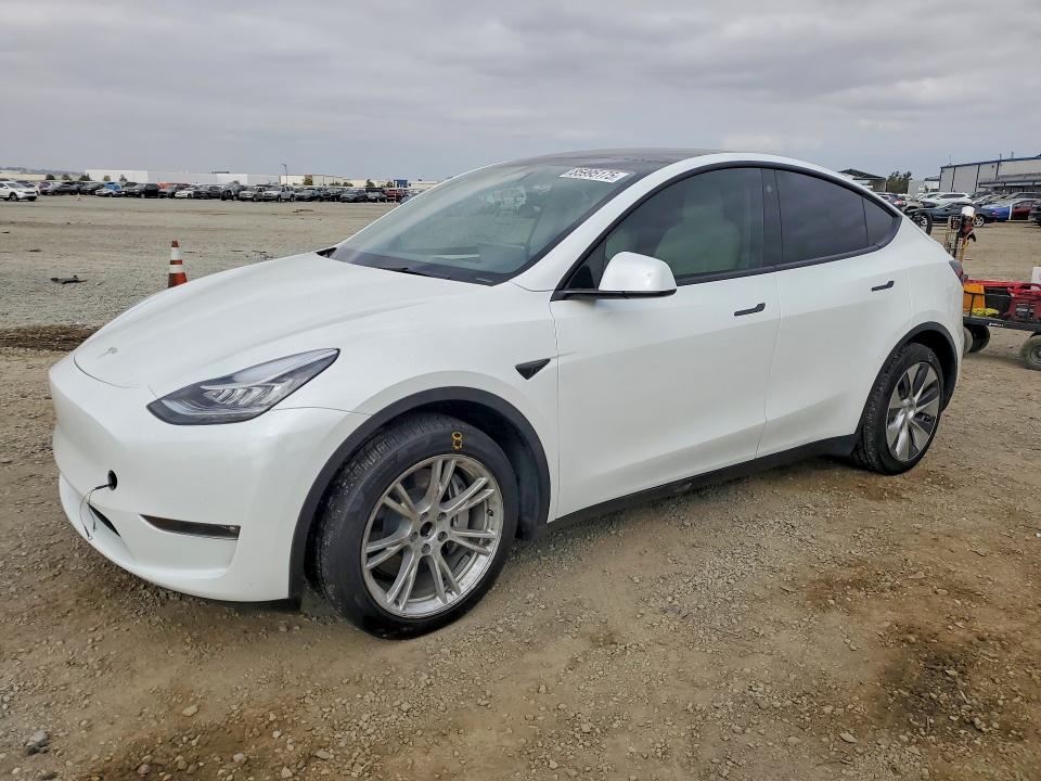 TESLA MODEL Y 2023 with VIN 7SAYGDEE0PF611963 - Photo from auction