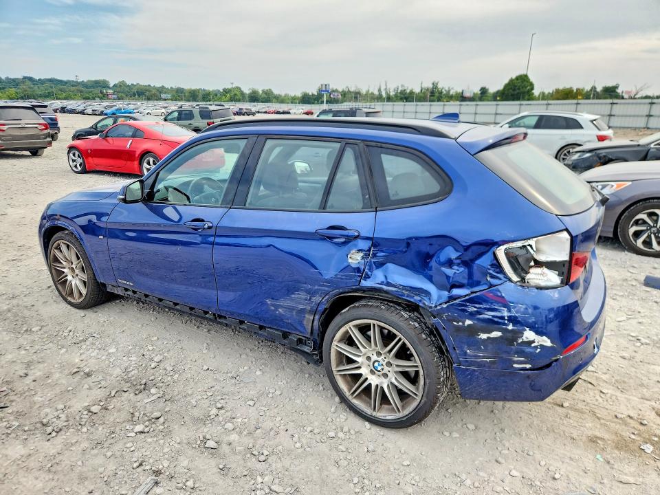 Снимка 2 от търг – 2014 BMW X1 с VIN WBAVM5C55EVV92534