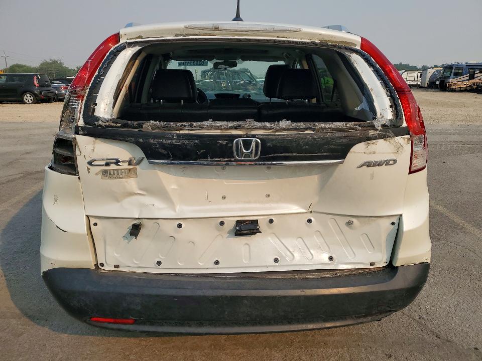 Photo 6 from auction – 2014 HONDA CR-V with VIN 5J6RM4H73EL090216
