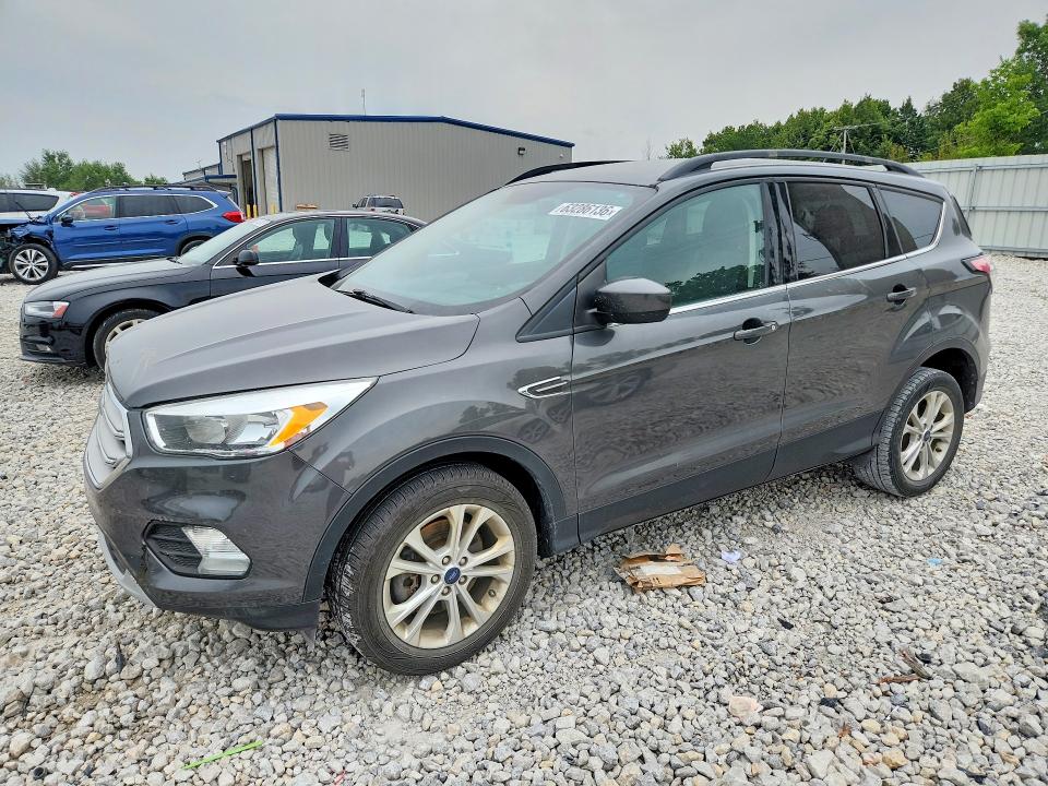 FORD ESCAPE 2018 with VIN 1FMCU9GD0JUB71030 - Photo from auction