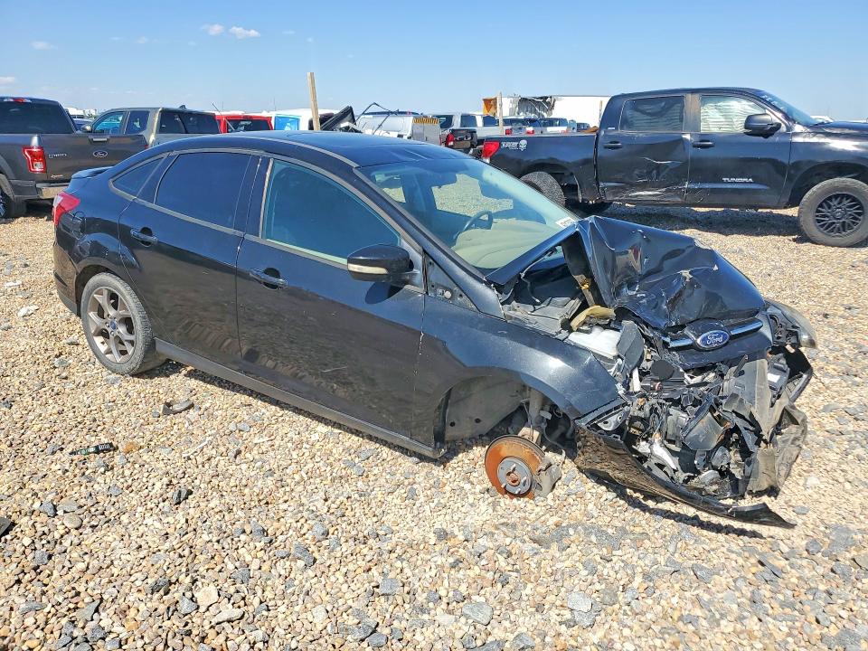 Photo 4 from auction – 2014 FORD FOCUS with VIN 1FADP3F26EL324234