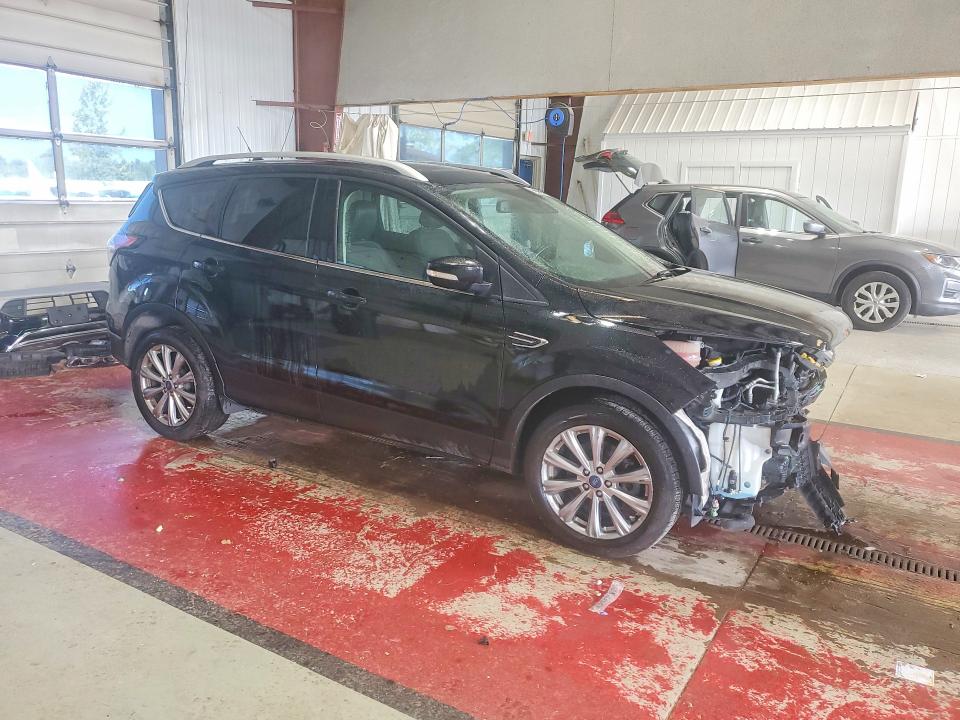 Photo 4 from auction – 2018 FORD ESCAPE with VIN 1FMCU9J95JUD55996