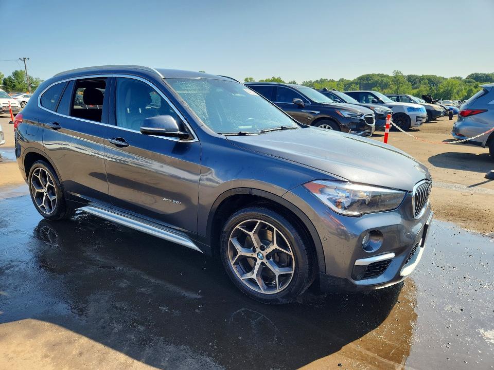 Photo 4 from auction – 2017 BMW X1 with VIN WBXHT3C3XH5F81805
