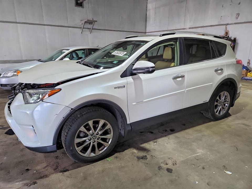 TOYOTA RAV4 HV 2016 with VIN JTMDJREV0GD032103 - Photo from auction