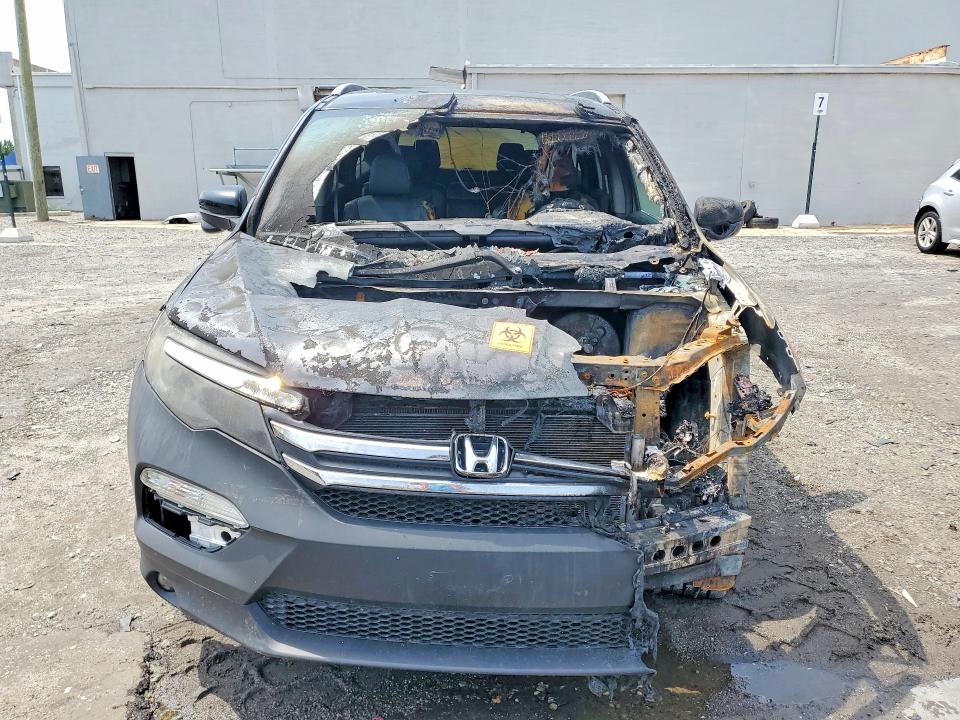 Photo 5 from auction – 2016 HONDA PILOT with VIN 5FNYF6H59GB081242
