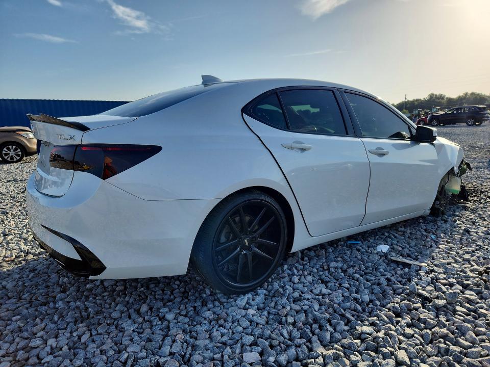 Photo 3 from auction – 2019 ACURA TLX with VIN 19UUB2F38KA001663