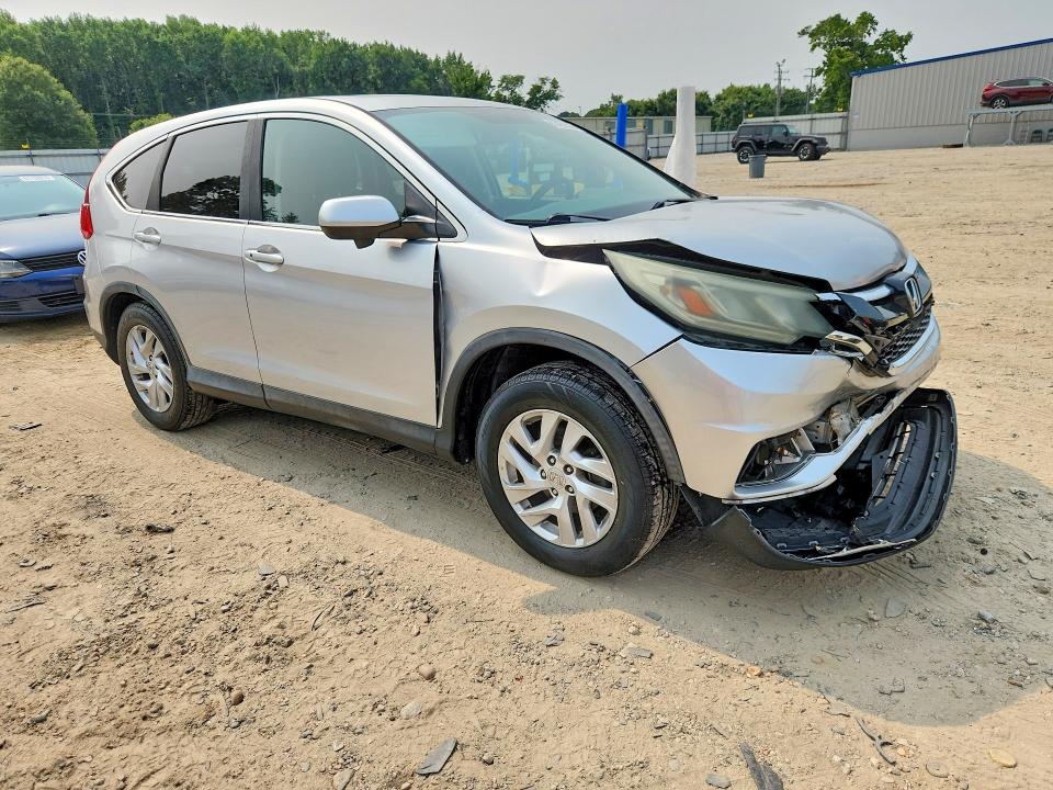Photo 4 from auction – 2015 HONDA CR-V with VIN 2HKRM3H55FH538167