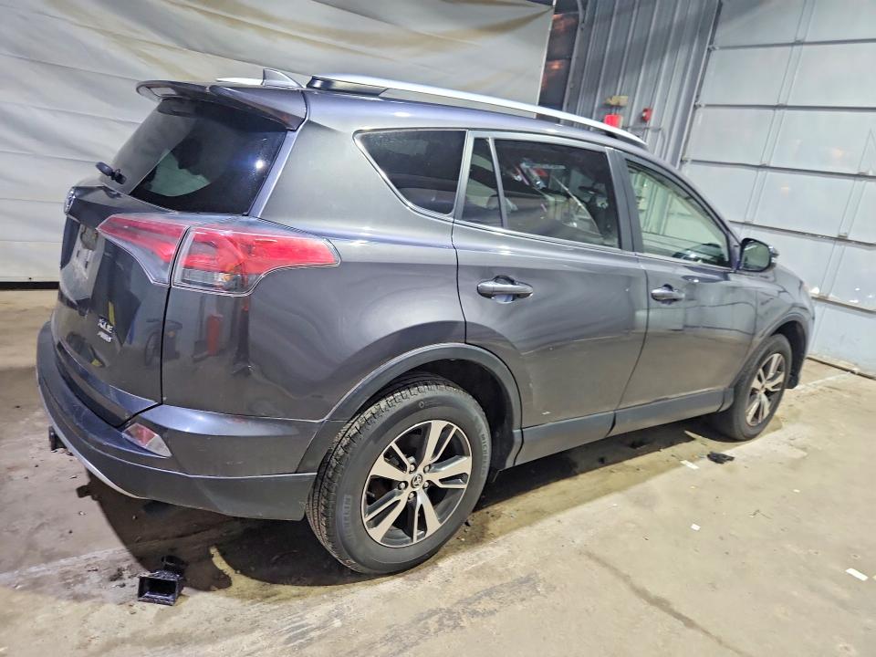 Photo 3 from auction – 2018 TOYOTA RAV4 with VIN JTMRFREV4JJ735820