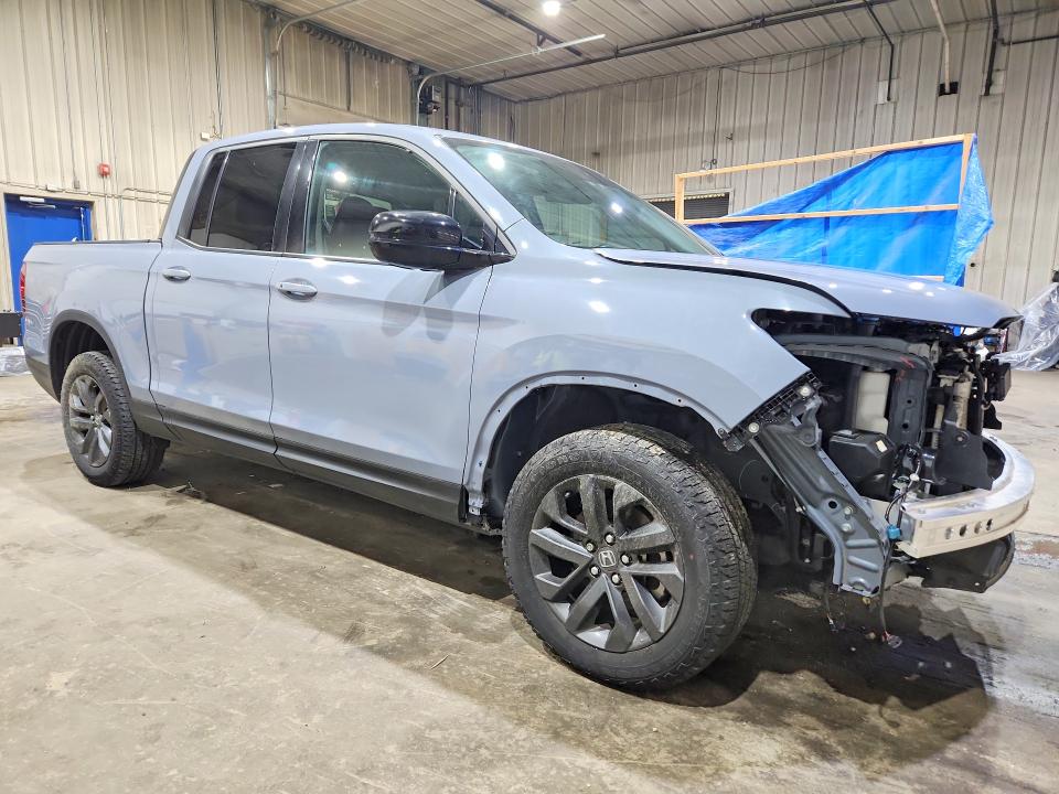 Photo 4 from auction – 2024 HONDA RIDGELINE with VIN 5FPYK3F17RB031329
