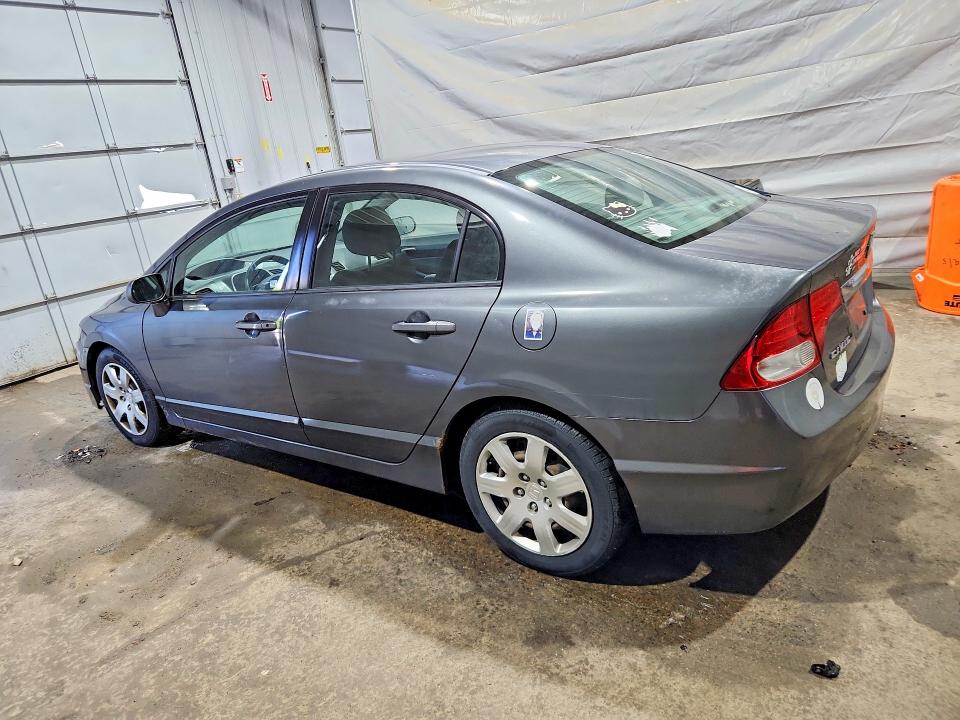Photo 2 from auction – 2010 HONDA CIVIC with VIN 2HGFA1F56AH553699