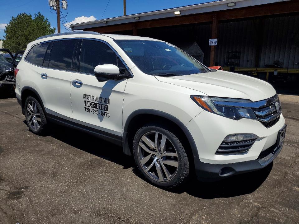 Photo 4 from auction – 2017 HONDA PILOT with VIN 5FNYF6H90HB082655