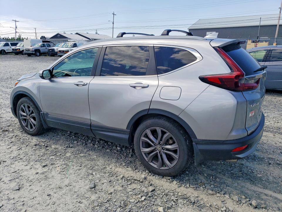 Photo 2 from auction – 2021 HONDA CR-V with VIN 2HKRW2H40MH229585