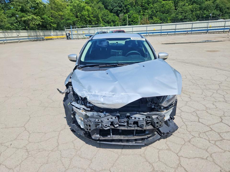Photo 5 from auction – 2016 FORD FOCUS with VIN 1FADP3K23GL226500