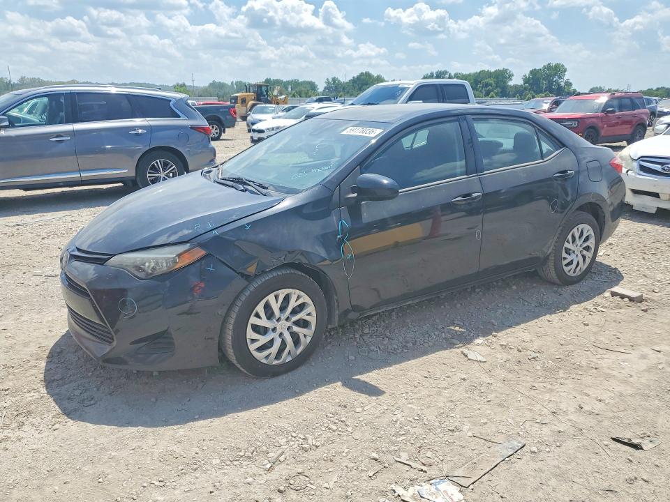 TOYOTA COROLLA 2019 with VIN 5YFBURHE6KP900279 - Photo from auction