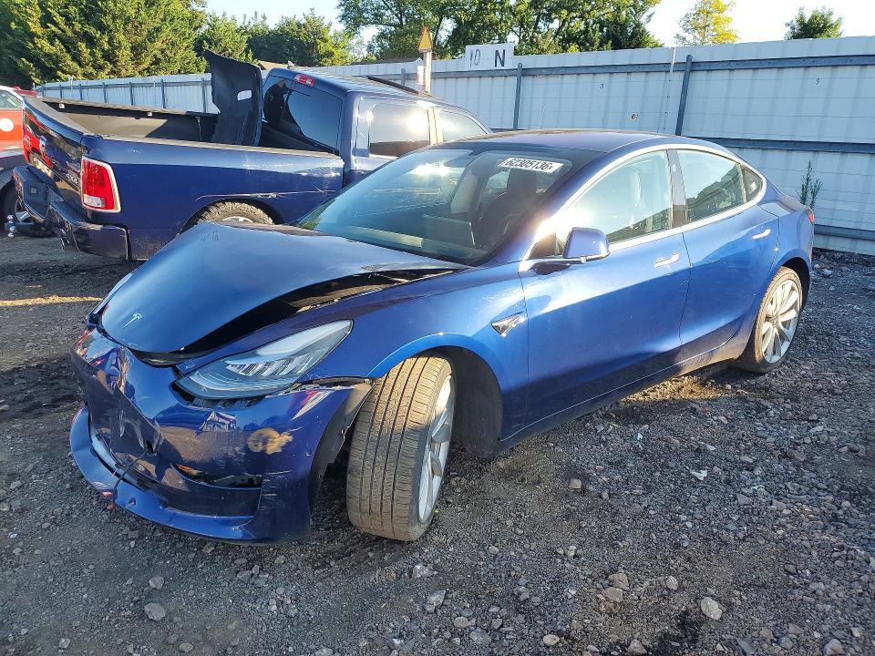 TESLA MODEL 3 2018 with VIN 5YJ3E1EB8JF063641 - Photo from auction