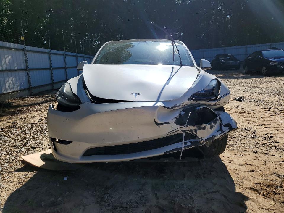 Photo 5 from auction – 2021 TESLA MODEL Y with VIN 5YJYGDEE0MF144830