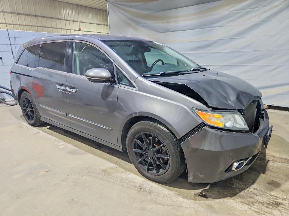 Photo 4 from auction – 2014 HONDA ODYSSEY with VIN 5FNRL5H9XEB010882