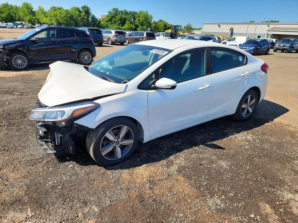 KIA FORTE 2018 with VIN 3KPFL4A7XJE242372 - Photo from auction