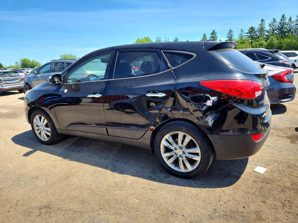Photo 2 from auction – 2012 HYUNDAI TUCSON with VIN KM8JUCAC0CU350885