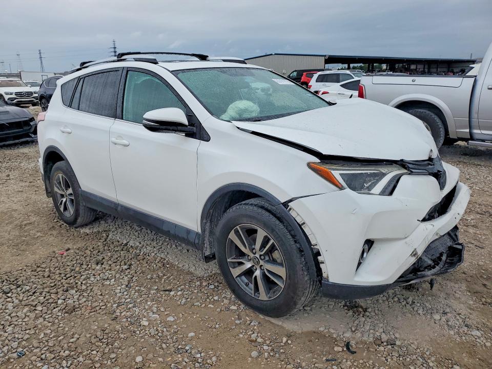 Photo 4 from auction – 2016 TOYOTA RAV4 with VIN 2T3WFREV9GW249940
