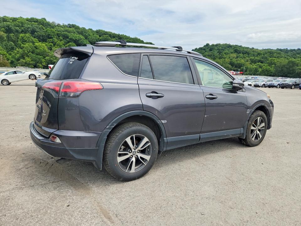 Photo 3 from auction – 2018 TOYOTA RAV4 with VIN JTMRFREV6JJ742459