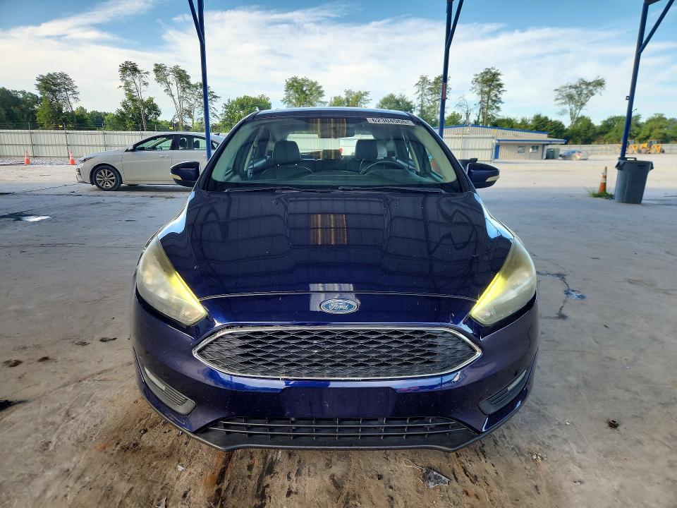 Photo 5 from auction – 2016 FORD FOCUS with VIN 1FADP3K20GL299517