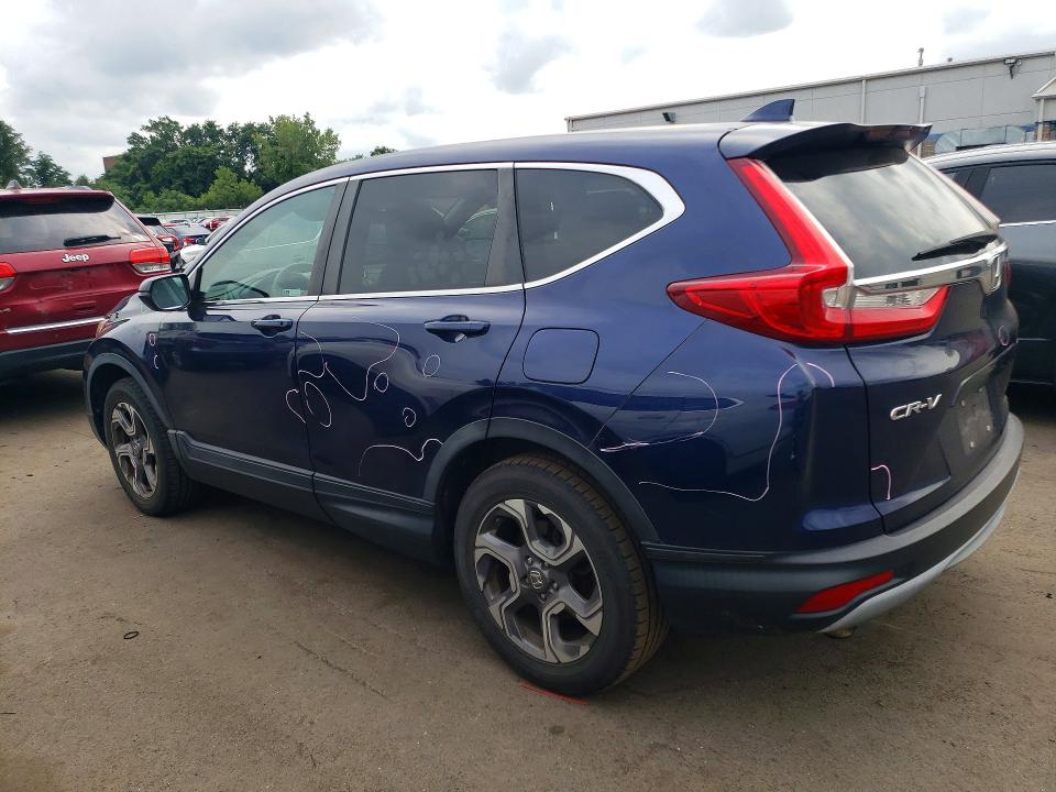 Photo 2 from auction – 2018 HONDA CR-V with VIN 7FARW2H54JE063949