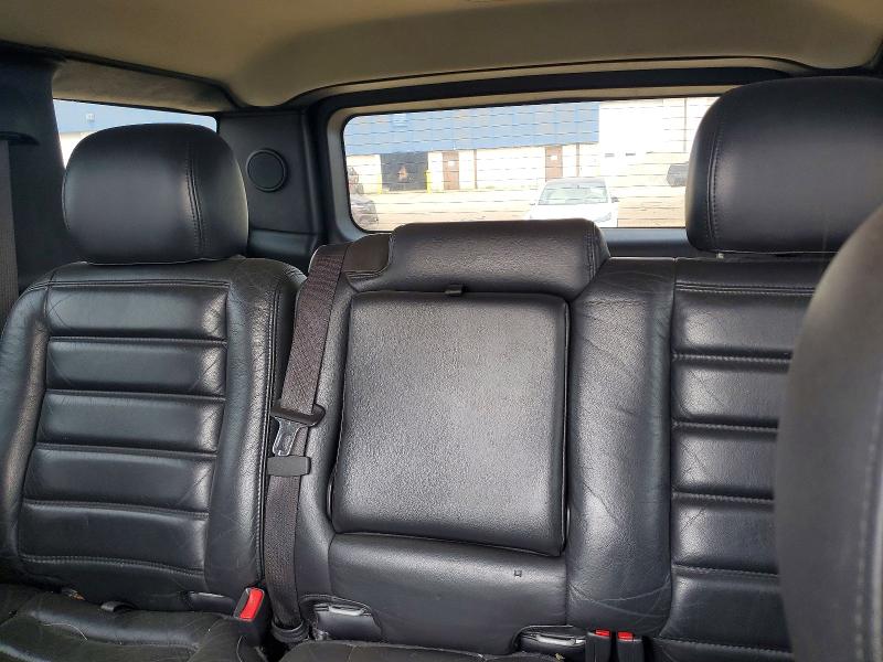 Photo 10 from auction – 2006 HUMMER H2 with VIN 5GRGN23UX6H122495