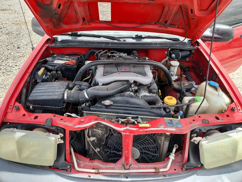 Photo 11 from auction – 2004 CHEVROLET TRACKER with VIN 2CNBJ134646918709