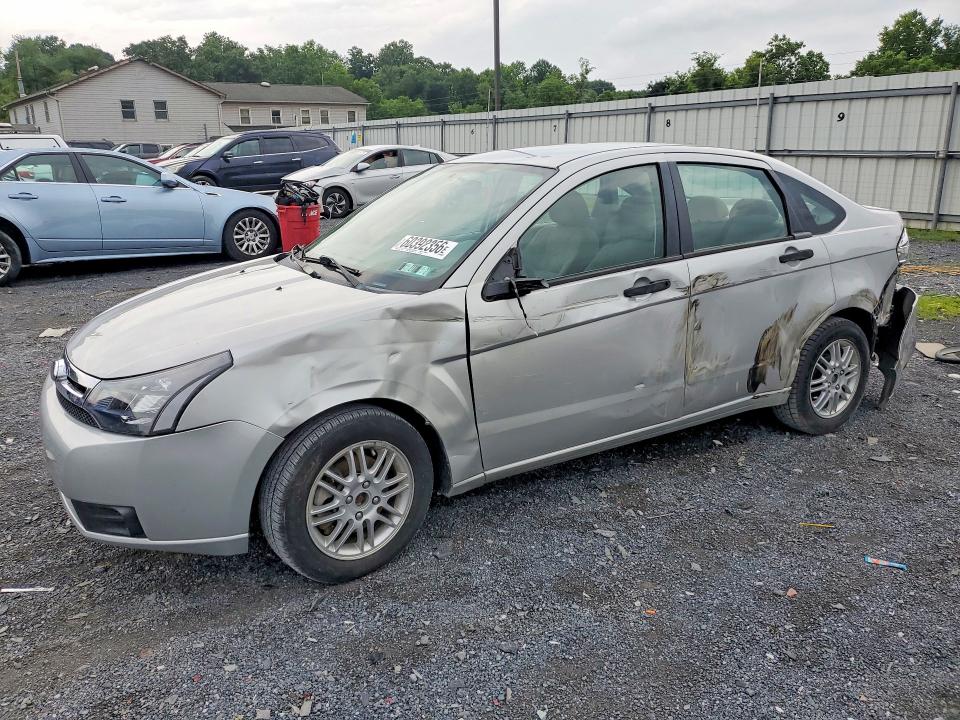 FORD FOCUS 2009 with VIN 1FAHP35N69W206654 - Photo from auction