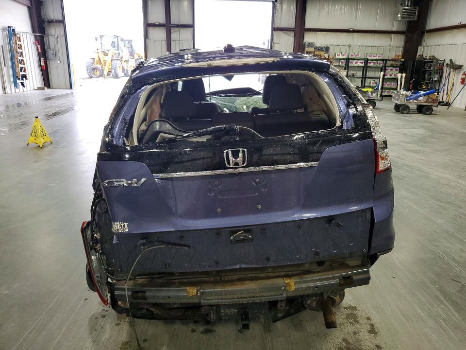 Photo 6 from auction – 2012 HONDA CR-V with VIN 5J6RM3H70CL014668