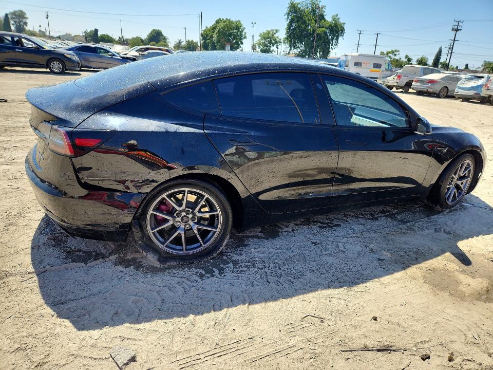 Photo 3 from auction – 2021 TESLA MODEL 3 with VIN 5YJ3E1EB5MF068087