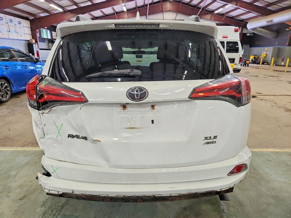Photo 6 from auction – 2016 TOYOTA RAV4 with VIN 2T3RFREV0GW481310