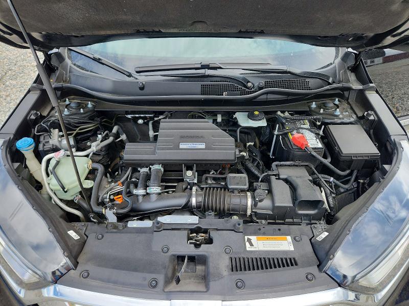 Photo 12 from auction – 2018 HONDA CR-V with VIN 7FARW1H91JE047334
