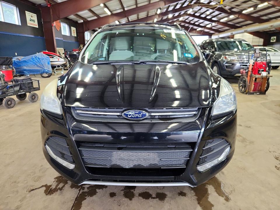 Photo 5 from auction – 2016 FORD ESCAPE with VIN 1FMCU9GX5GUA41568