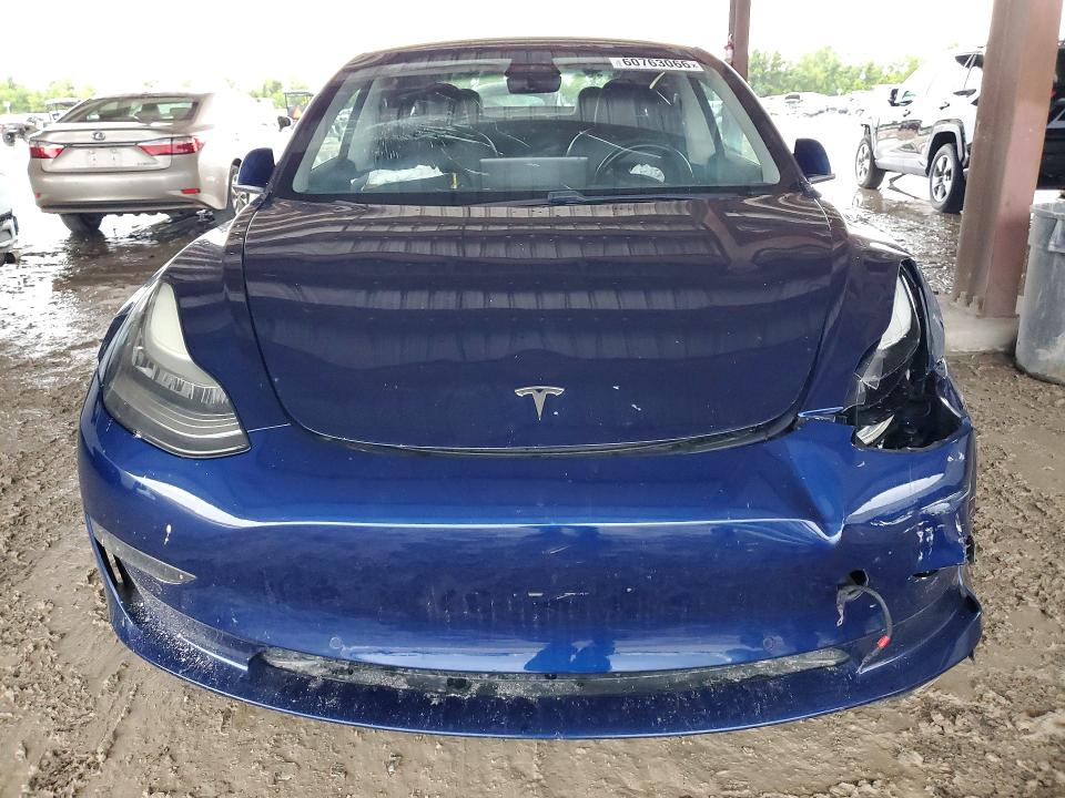 Photo 5 from auction – 2018 TESLA MODEL 3 with VIN 5YJ3E1EB7JF105071