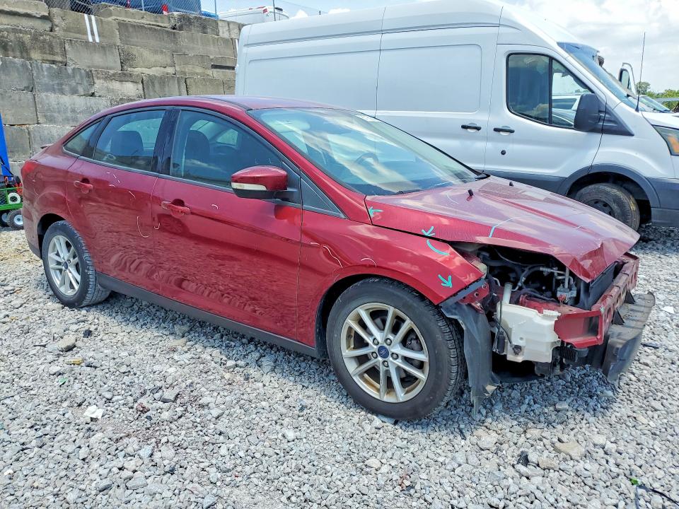 Photo 4 from auction – 2016 FORD FOCUS with VIN 1FADP3F20GL301079