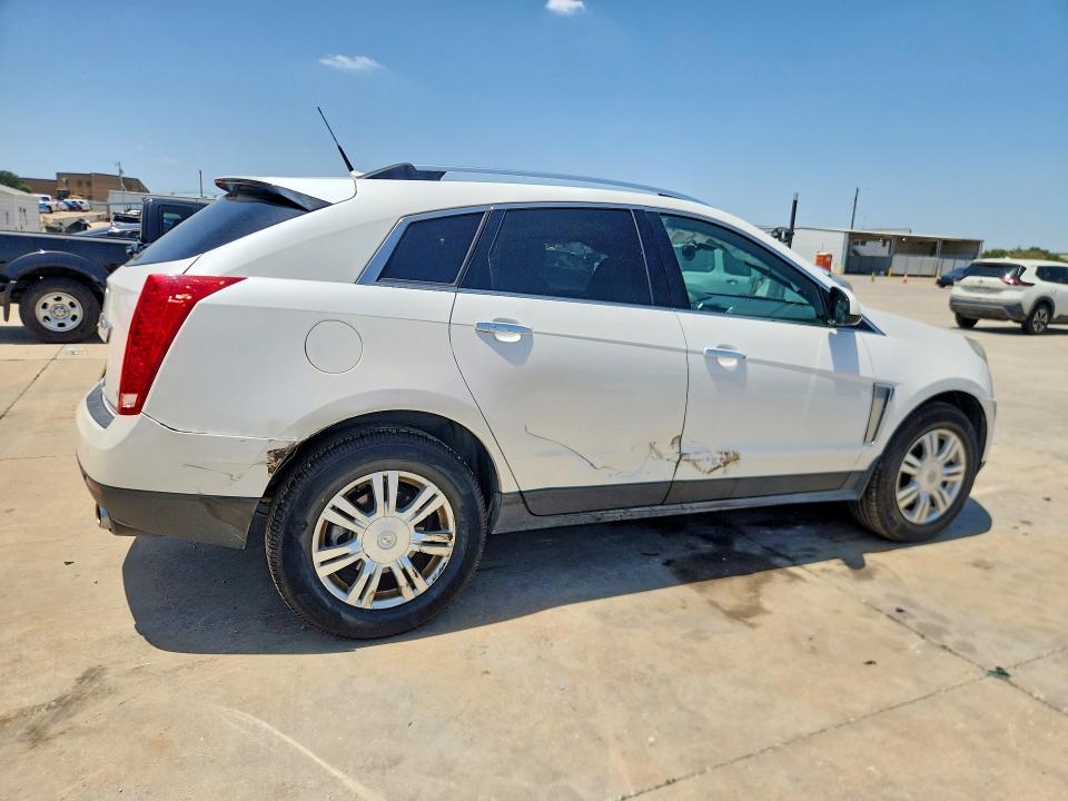 Photo 3 from auction – 2014 CADILLAC SRX with VIN 3GYFNBE34ES559541